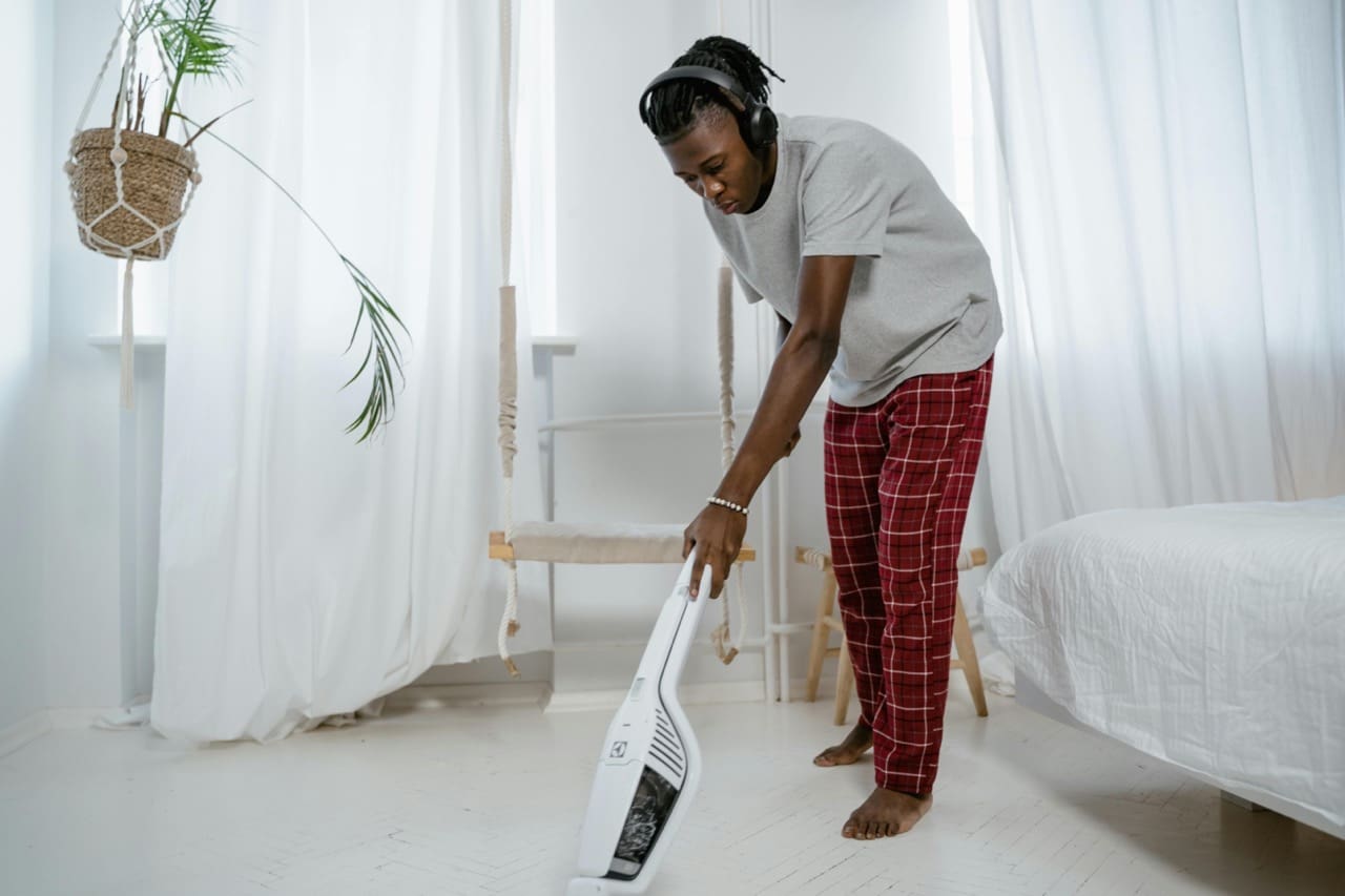 Image showing a man cleaning a One bedroom apartment