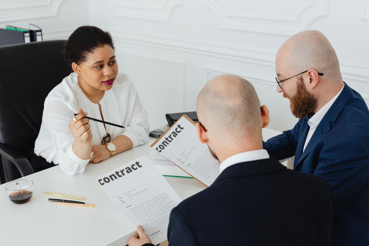 Image showing people going over a sublease contract in Dubai