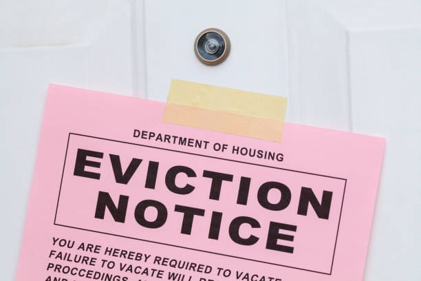 Image showing an eviction notice on a guests' door.