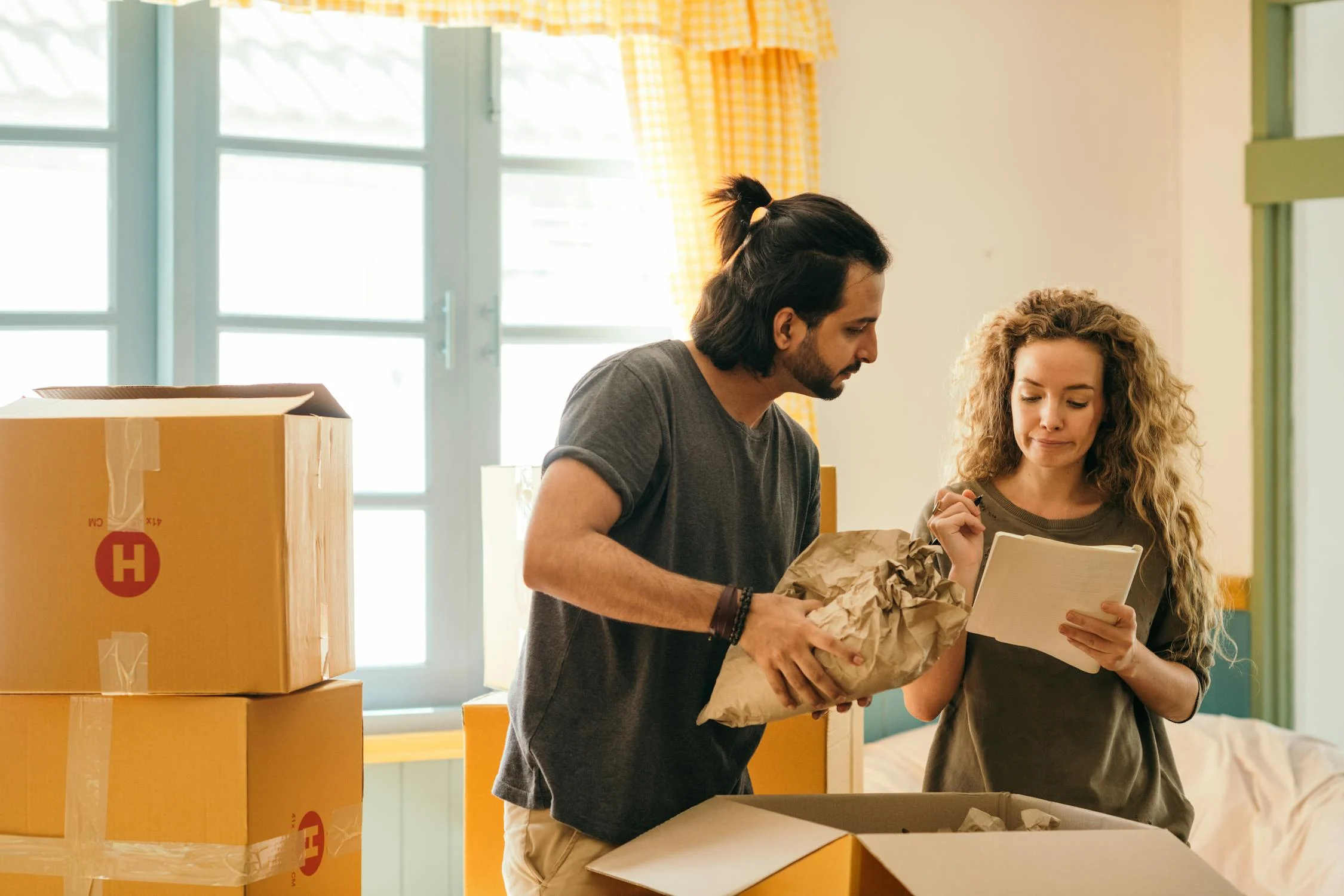 Image showing a couple moving into their long term rental apartment