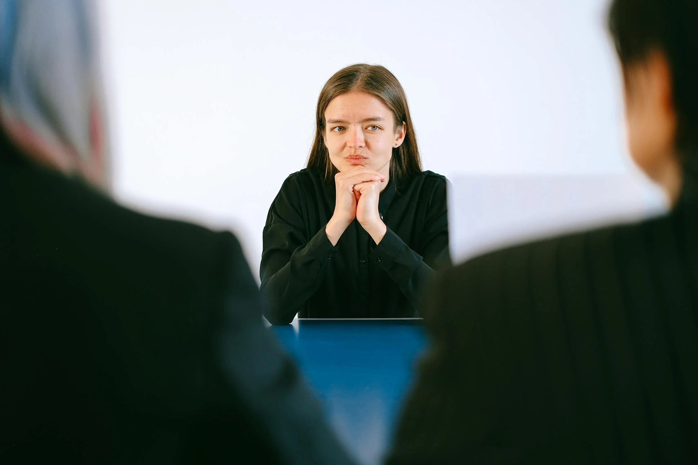 Image showing a woman thinking about short term rental management fees in Dubai