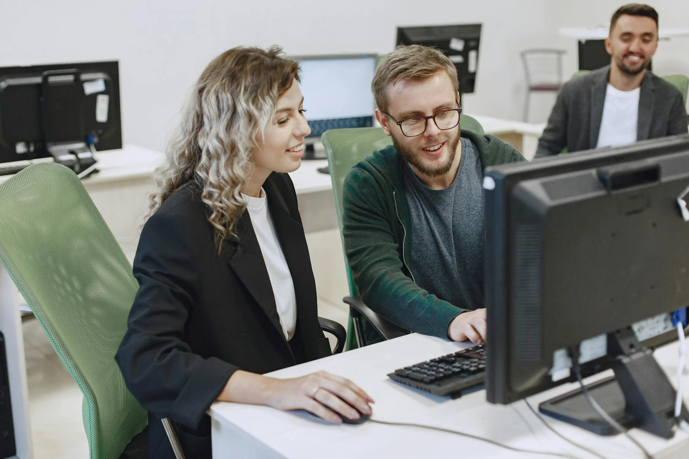 Image showing two Airbnb hosts discussing 