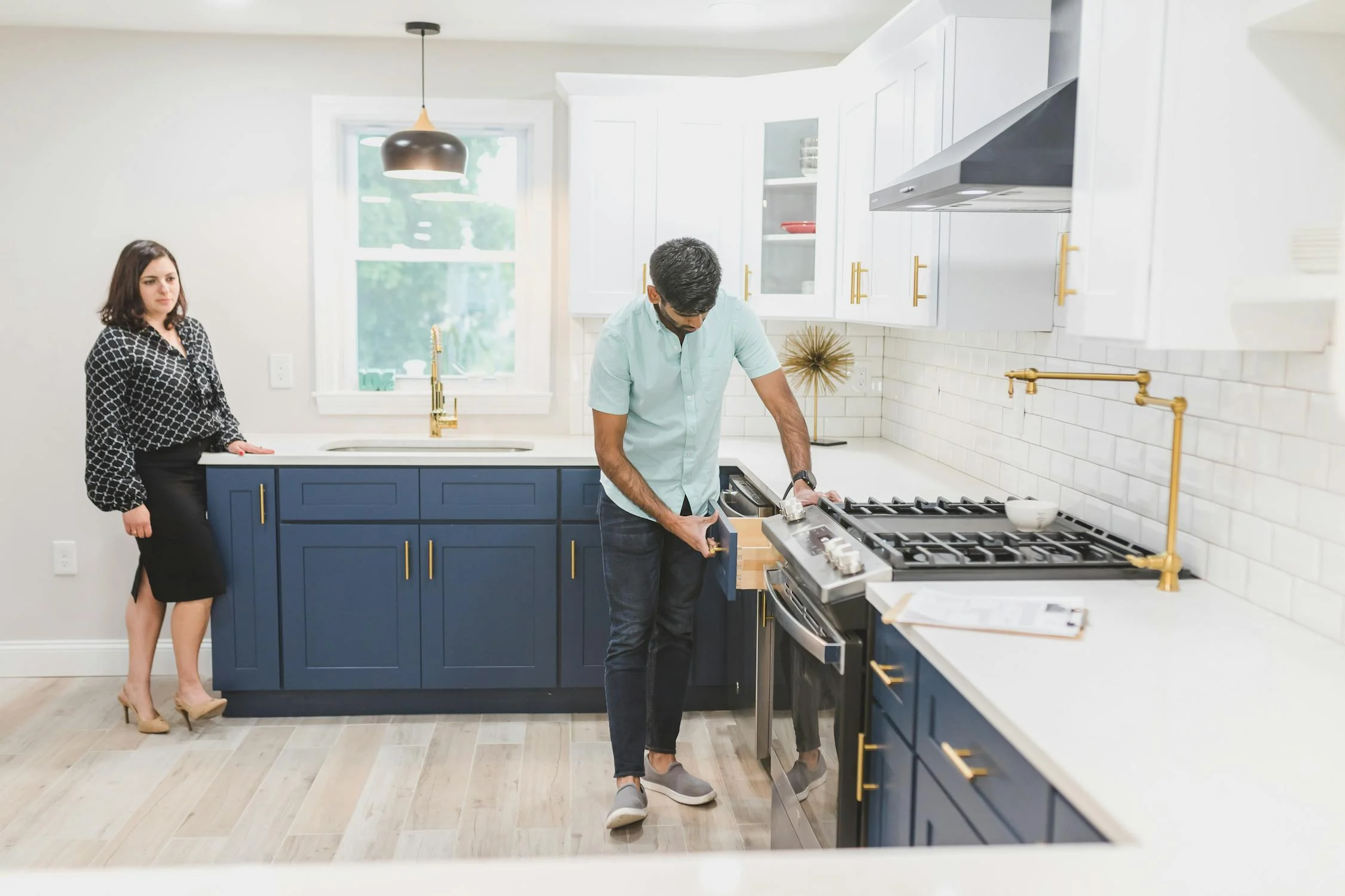 Image showing a couple inspecting a short term rental property before handing it over for property management