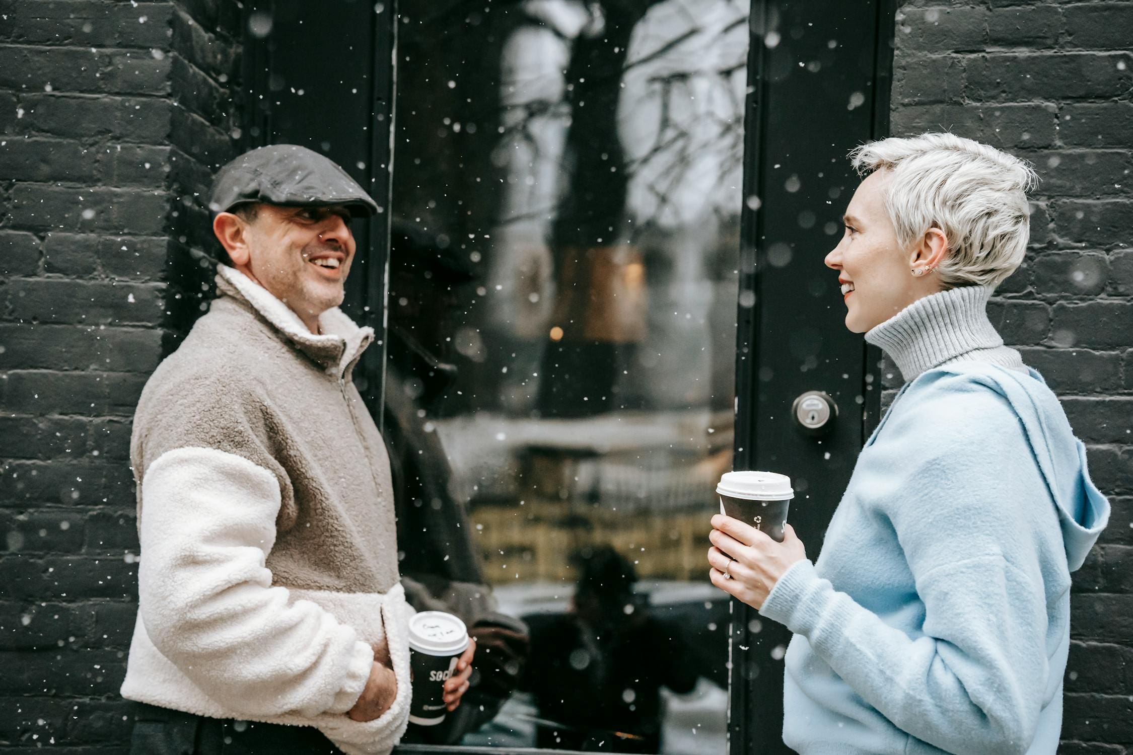 Image showing happy hosts who fixed negative Airbnb reviews