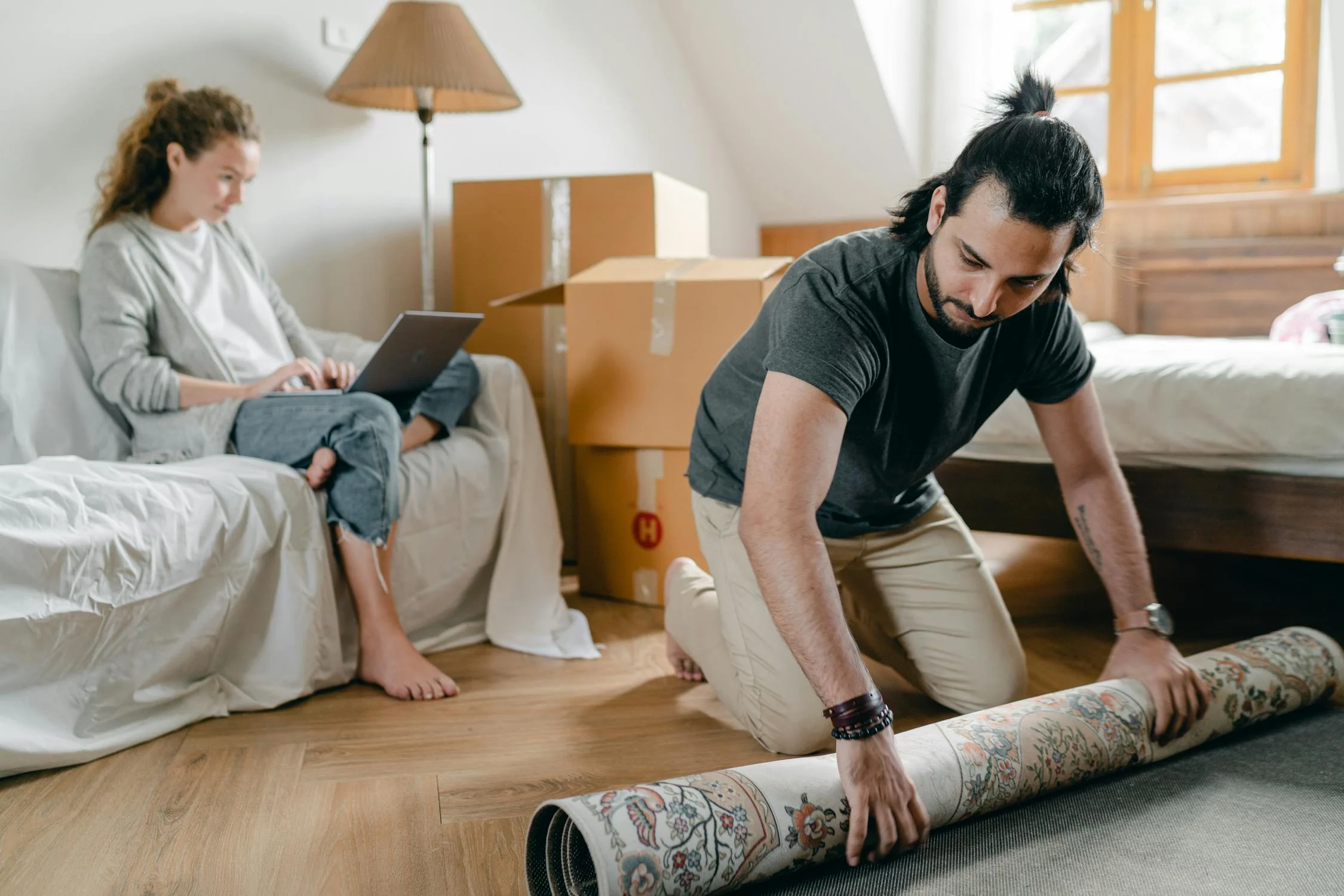 Image showing a couple setting up an apartment for Airbnb