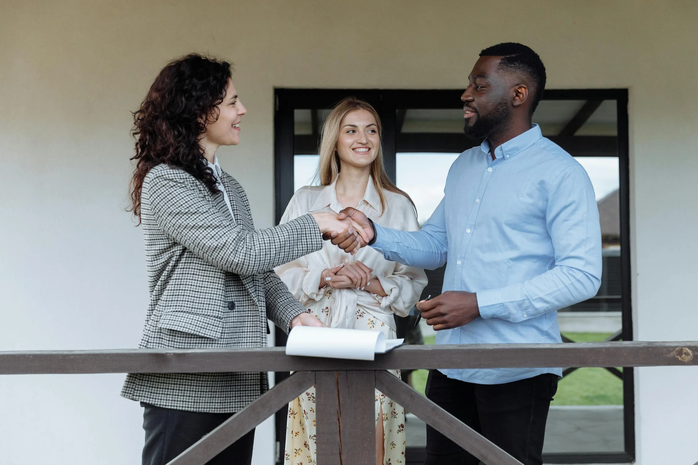 Image showing a man and woman agreeing on a vacation rental management agreement