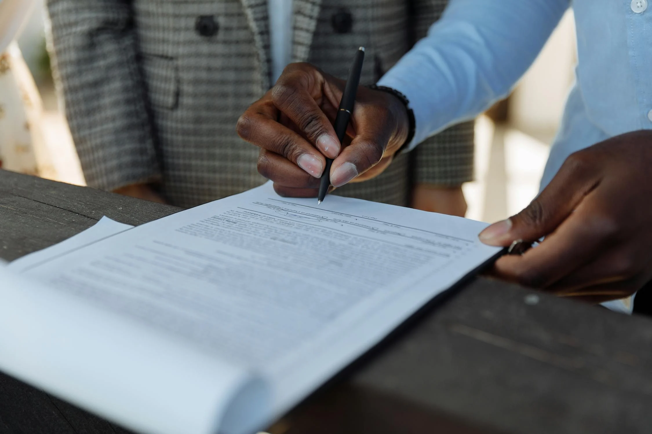 Image showing a man going over a short term rental property management agreement