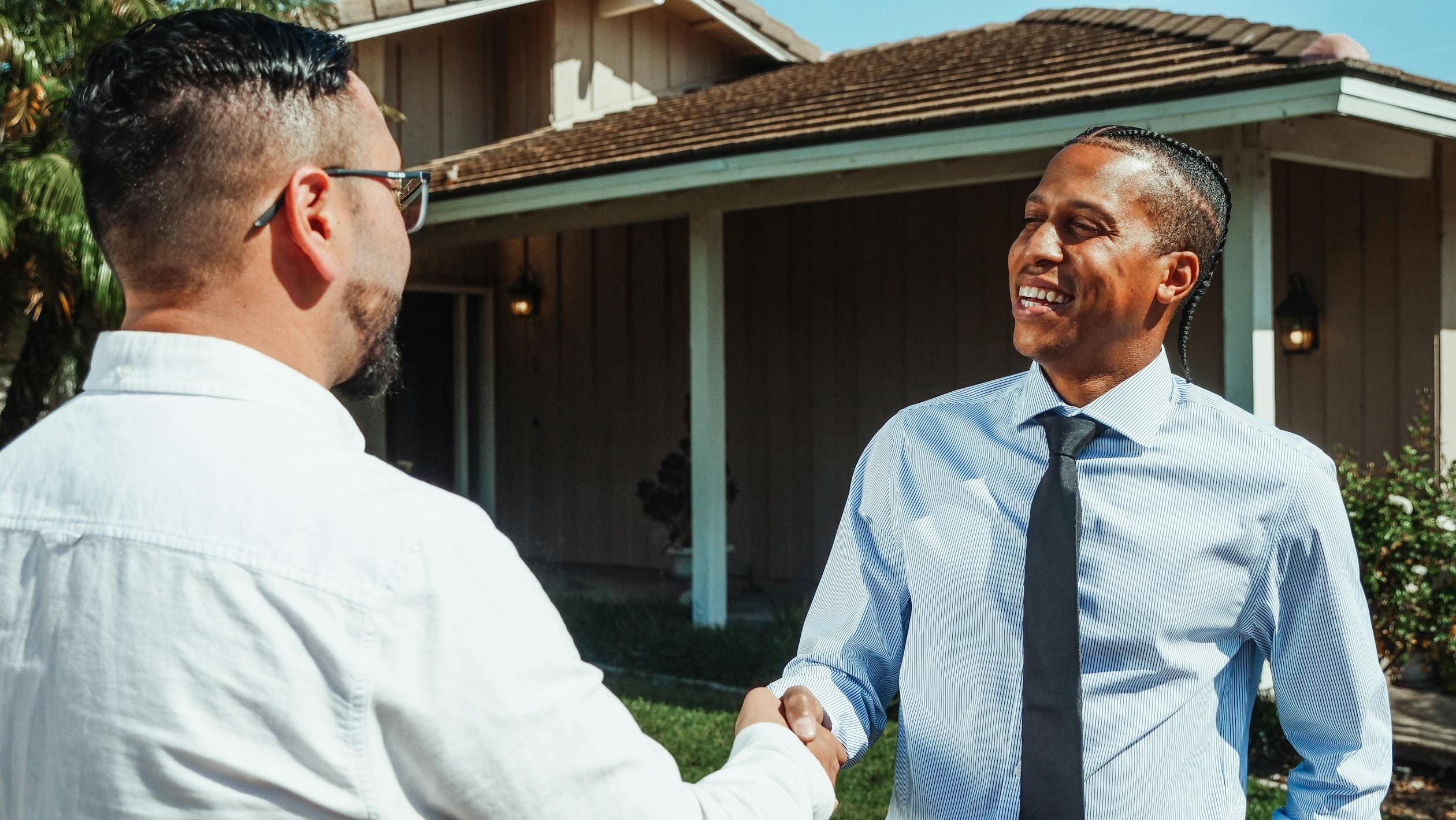 Image showing two people in a handshake deal