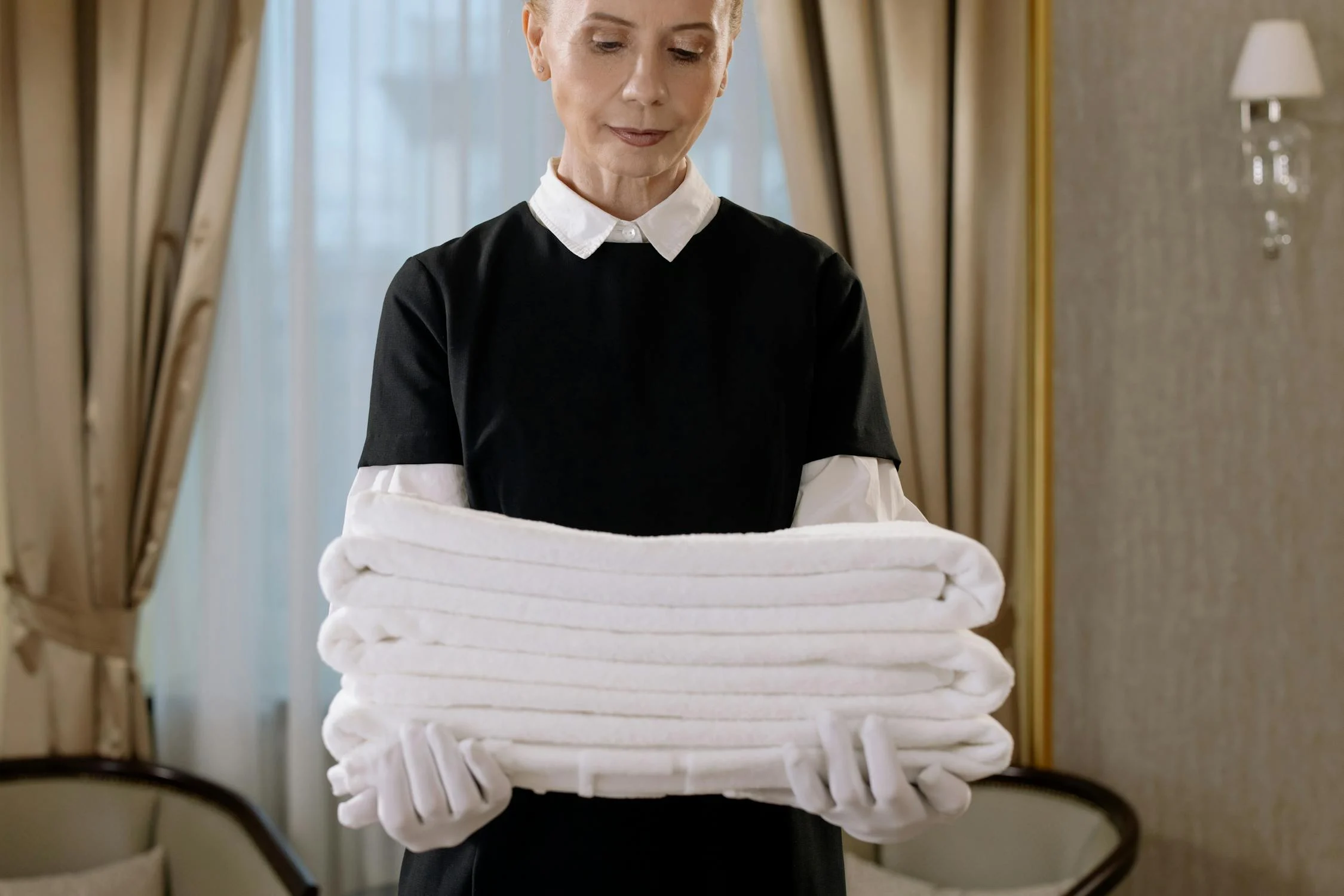 Image showing a lady with fresh towels