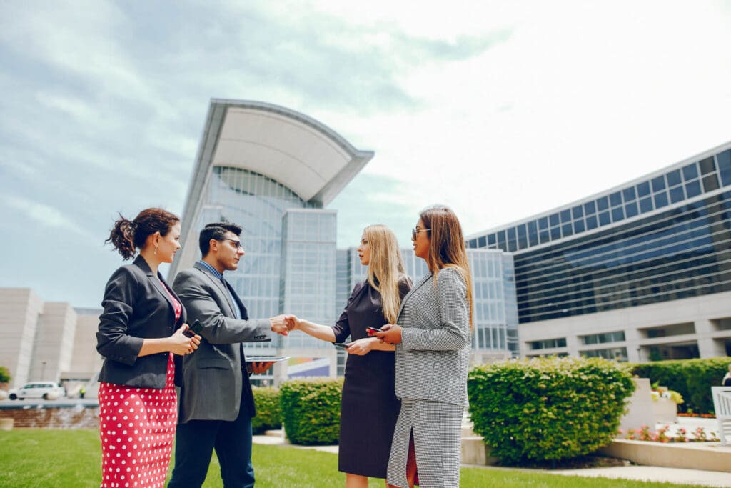 Man discussing the purchase of a new DIFC property with agents