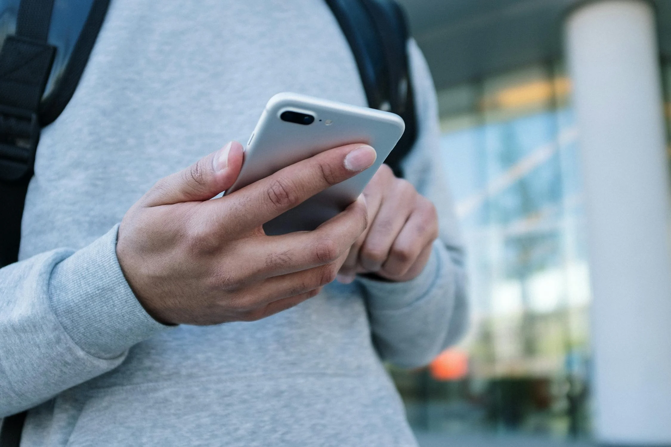 Image showing a person carefully checking photos on Airbnb