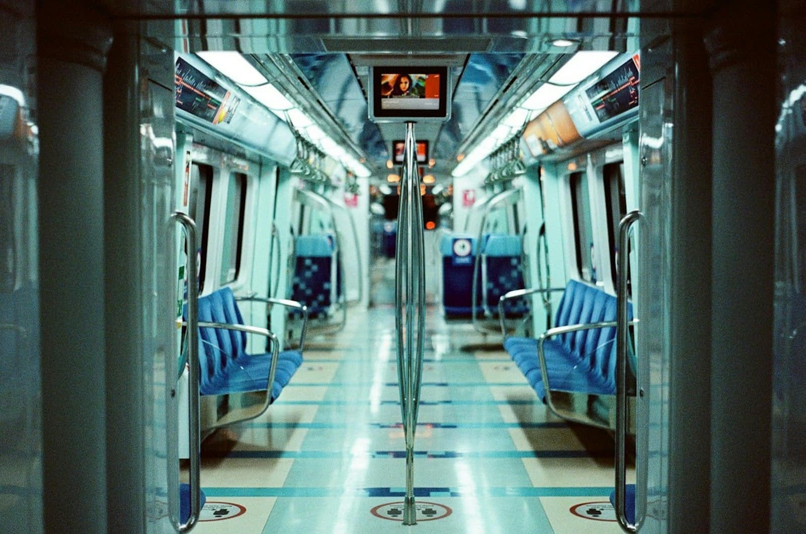 Inside the Palm Jumeirah Monorail, with seats and clear windows. 