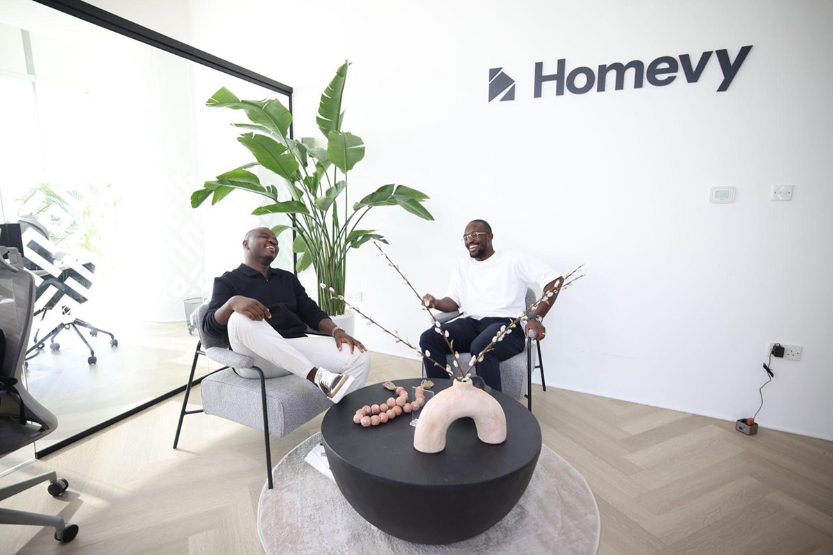 Image of two men discussing at Homevy
