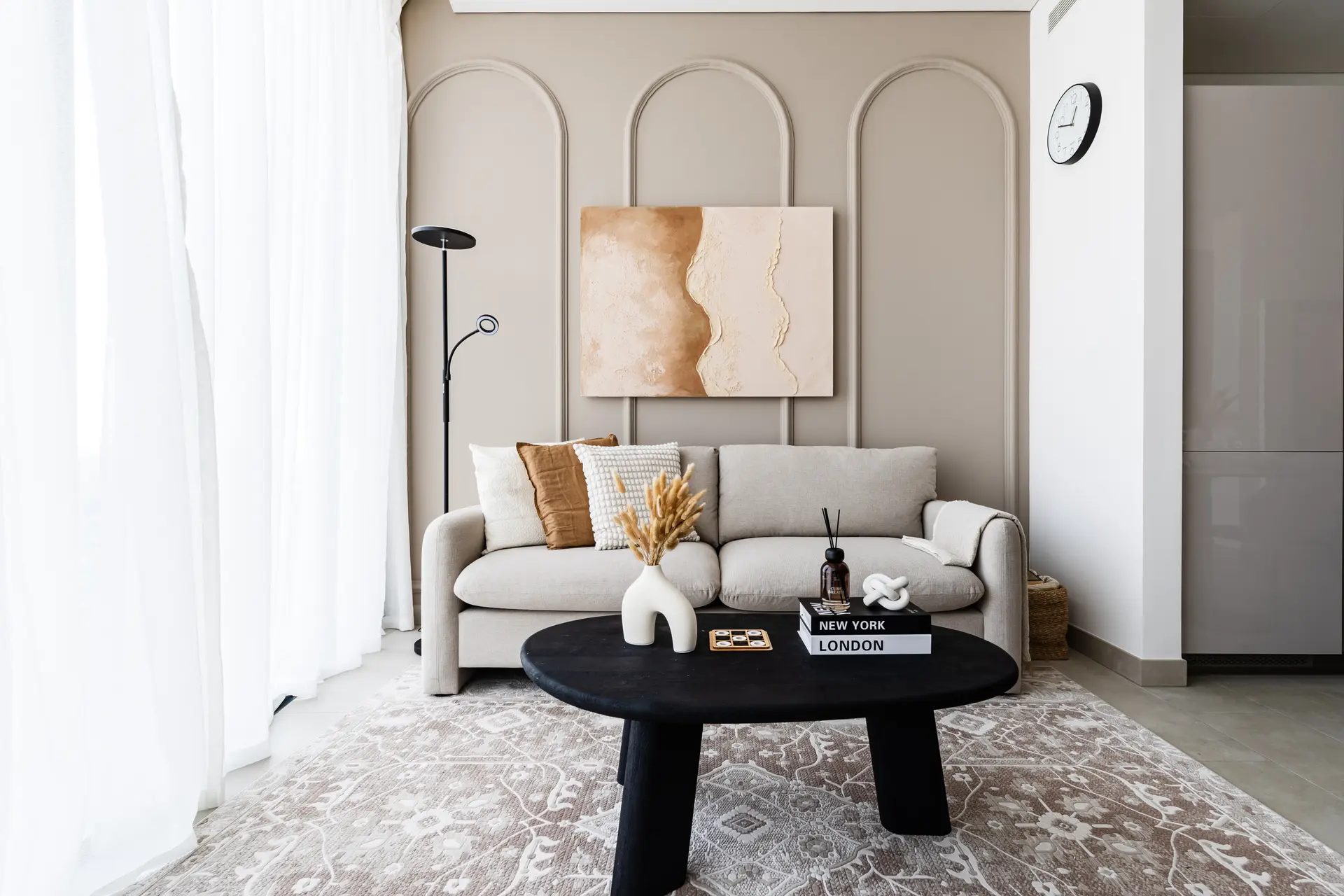 Compact sofa setup with decorative elements in a modern apartment