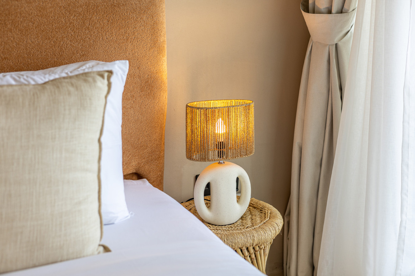 Plush Pillows layered on the bed for added comfort and style.
