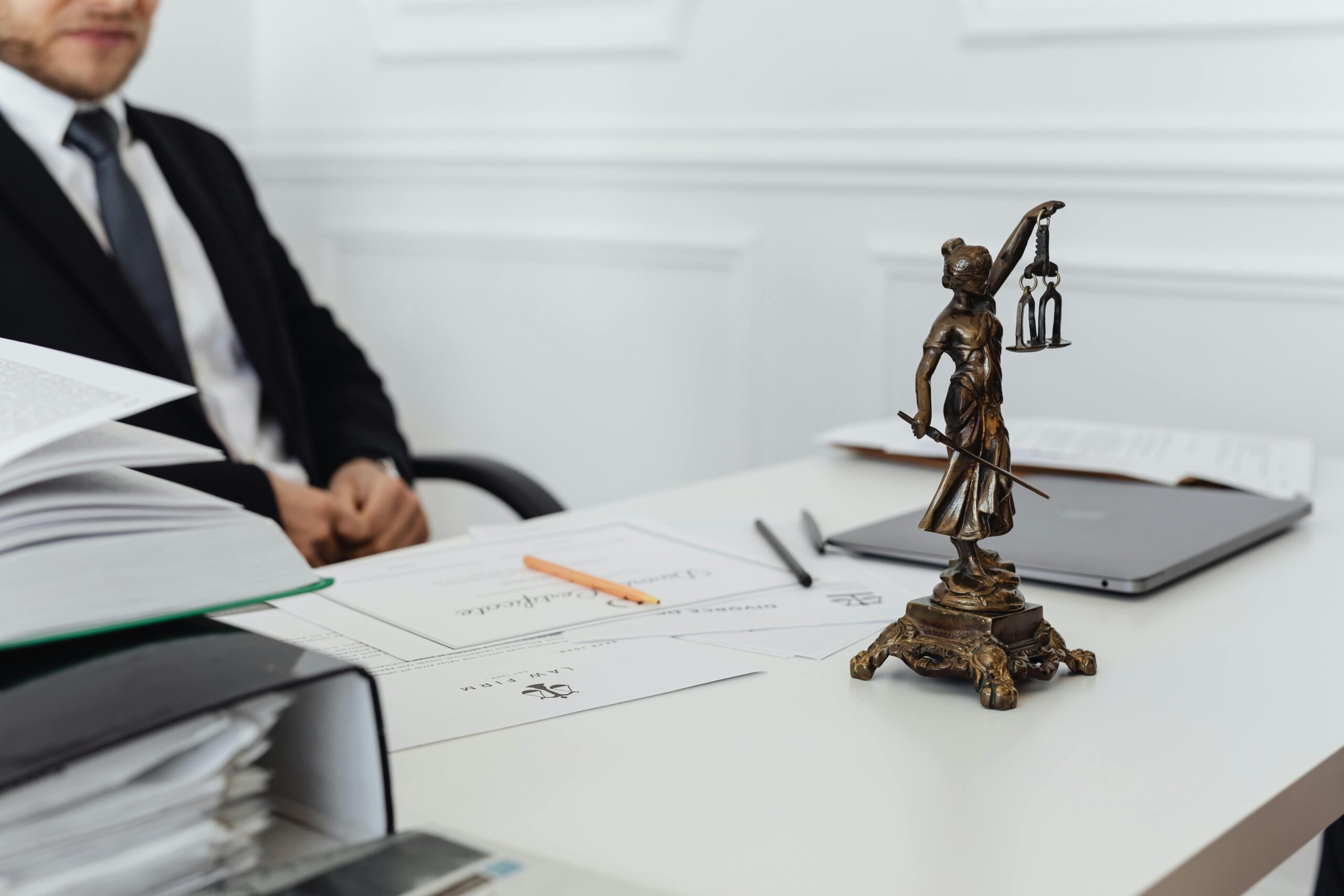 Photo of a Dubai lawyer sitting behind his desk