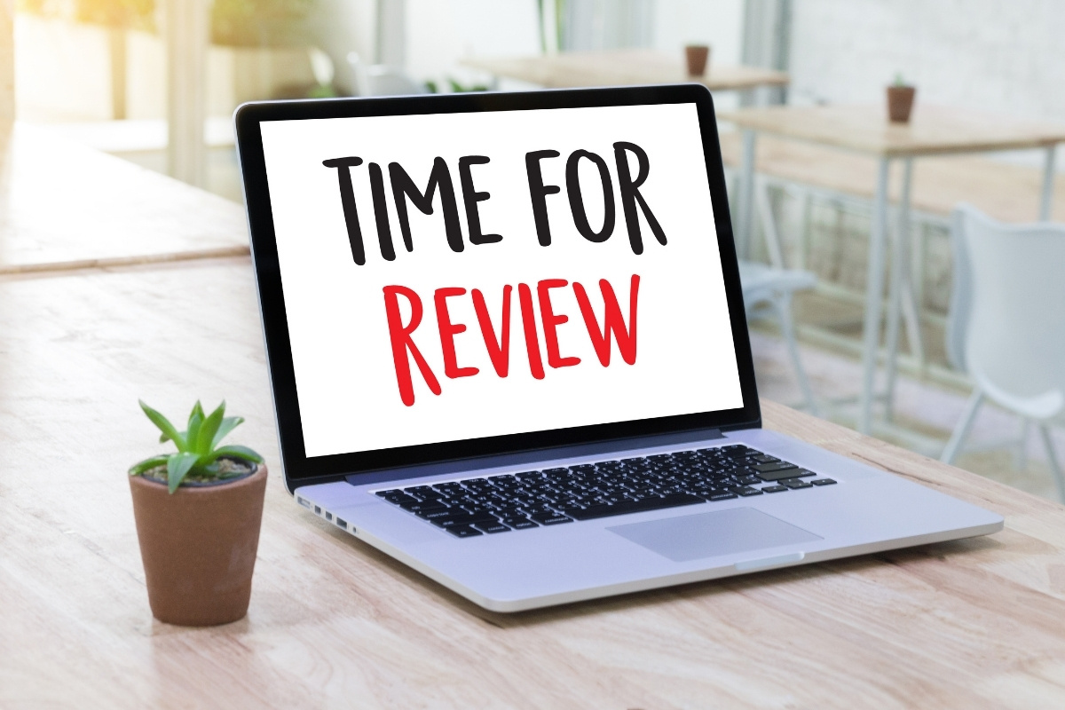 Laption with on screen text showing time for review
